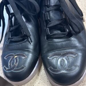 Chanel Interlocking CC Lambs
Leather Sneakers